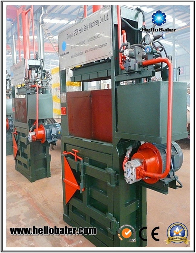 Old clothes manual vertical baler for baling waste tyre &amp; old clothes